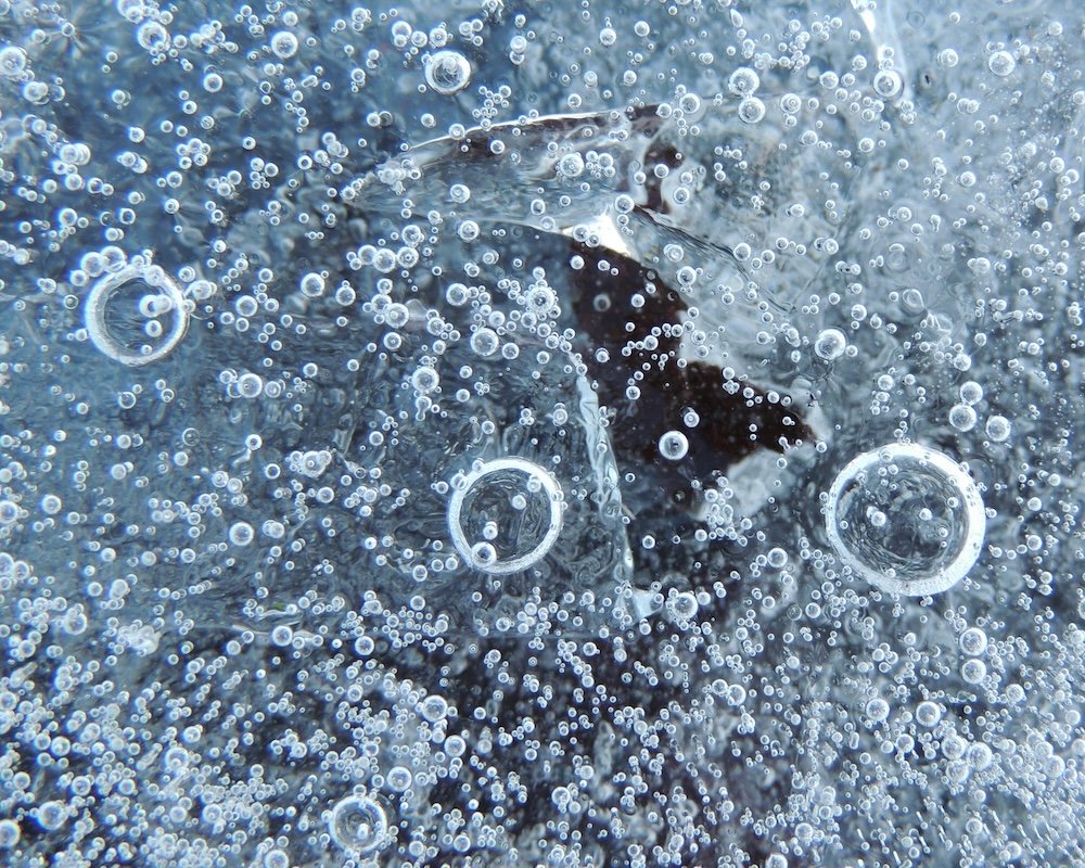 Abraham Lake frozen methane ice bubbles hidden gem Alberta winter 
