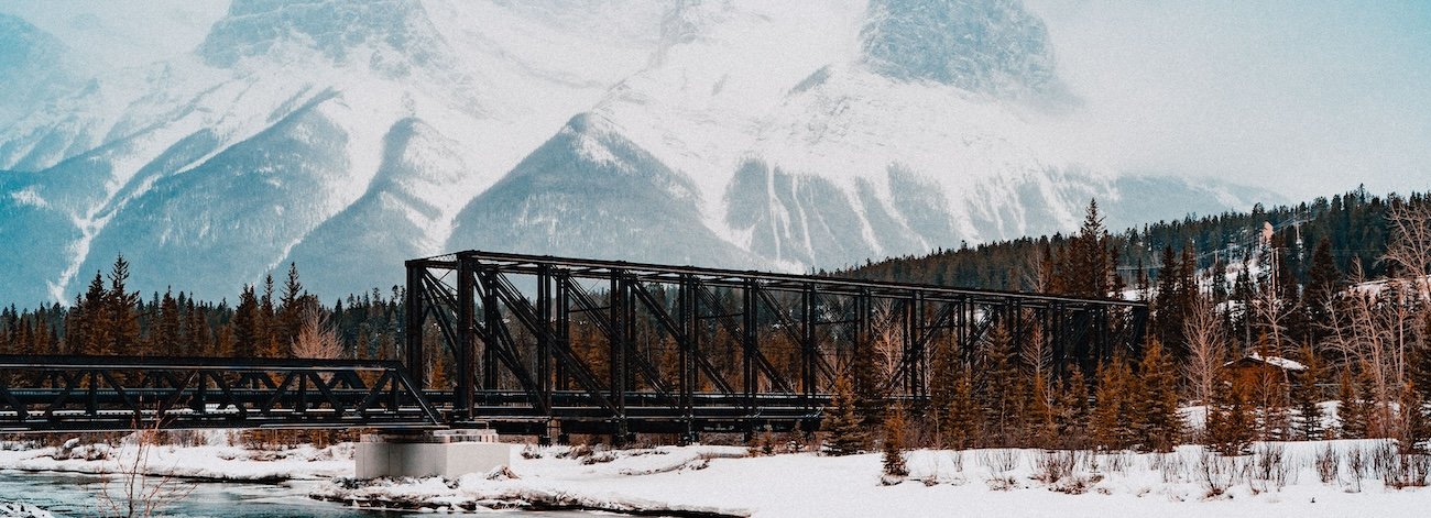 Historic Canmore Engine Bridge, a peaceful local hidden gem with views of the Three Sisters mountains