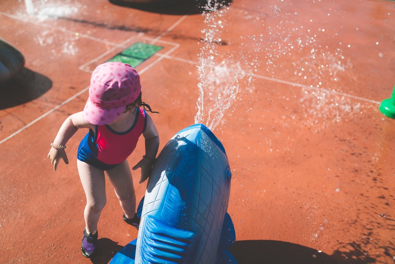 Kids enjoying a free spray park in Edmonton