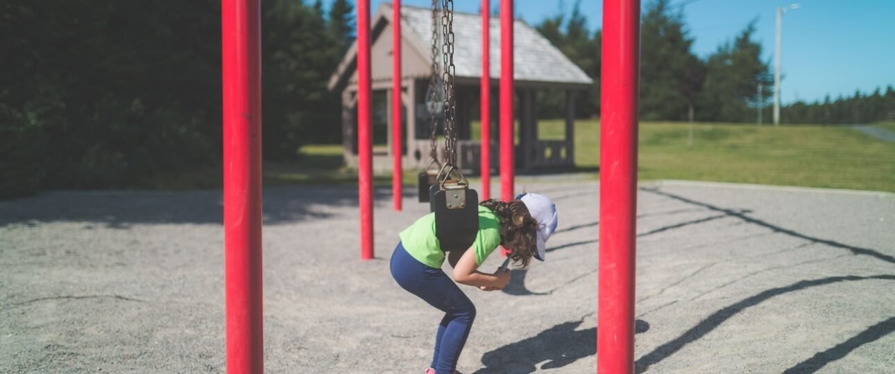 Kids playing at a free spray park in Edmonton during summer