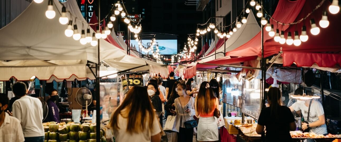 Inglewood Night Market in Calgary with local vendors, food trucks and evening lights