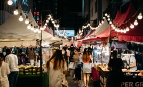 Inglewood Night Market in Calgary with local vendors, food trucks and evening lights