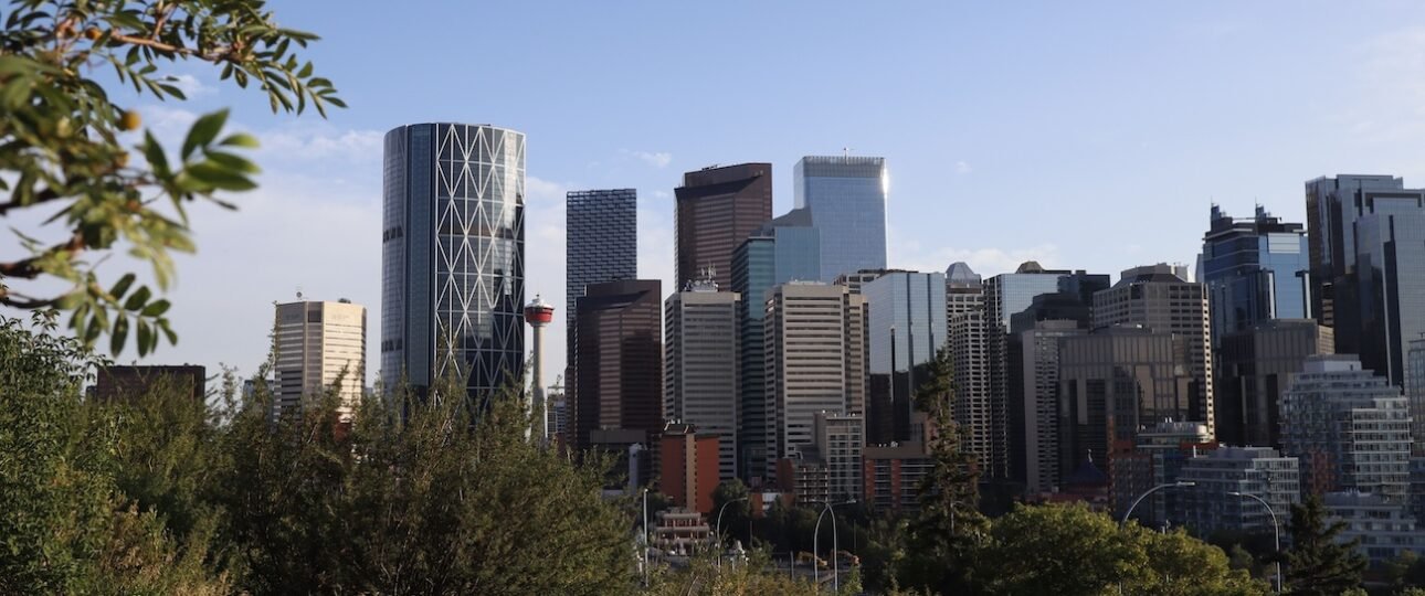 Calgary skyline with housing and cost of living charts 2026