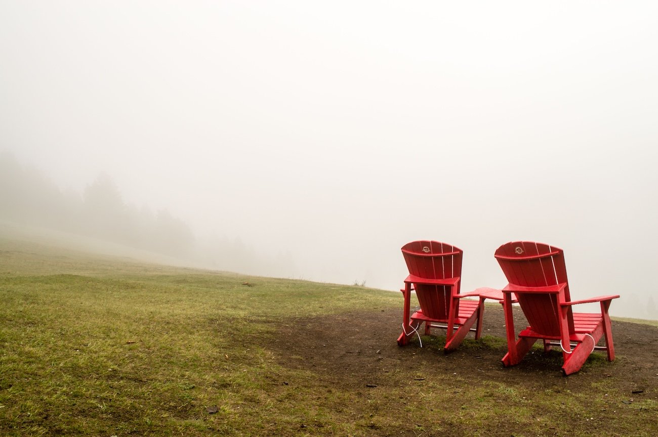 Parks Canada red chairs overlooking the lakes on Valley of the Five Lakes Jasper trail